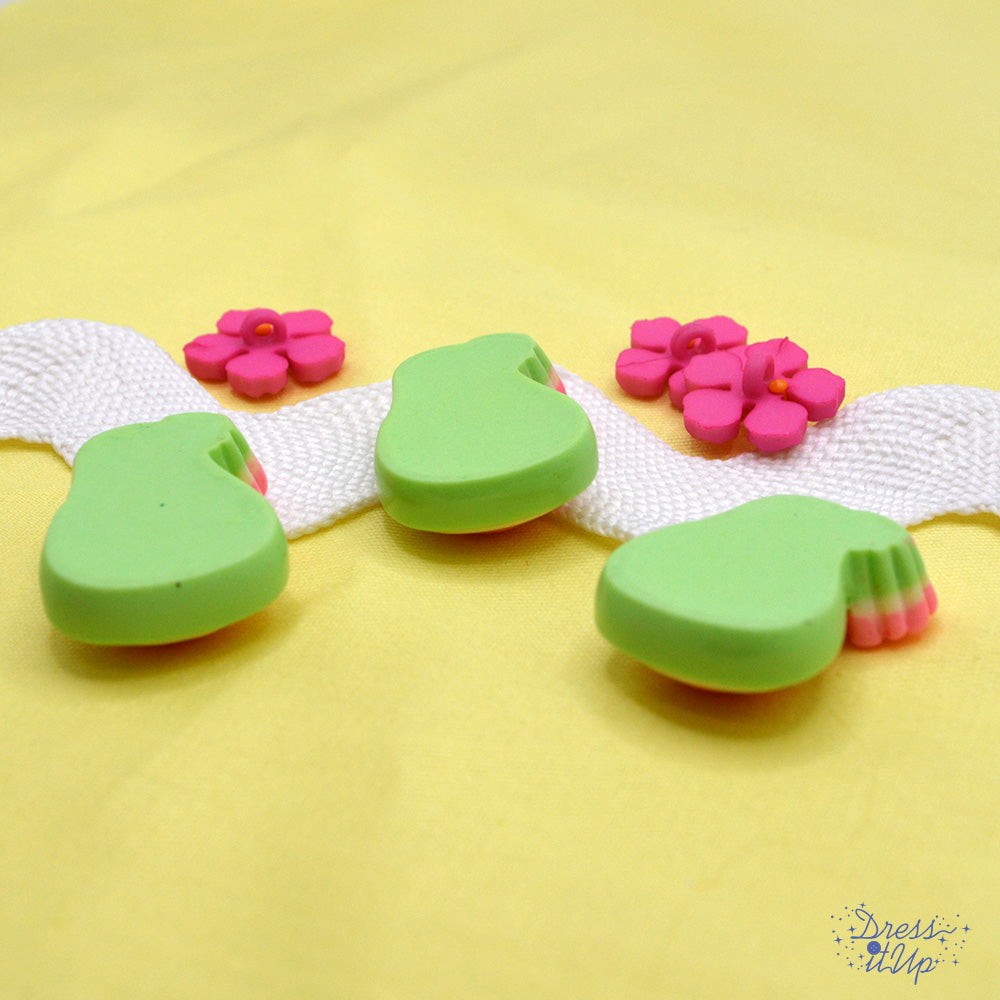 Backs of 6 shank and flat-back button embellishments pack with 3 avocados and 3 pink flowers