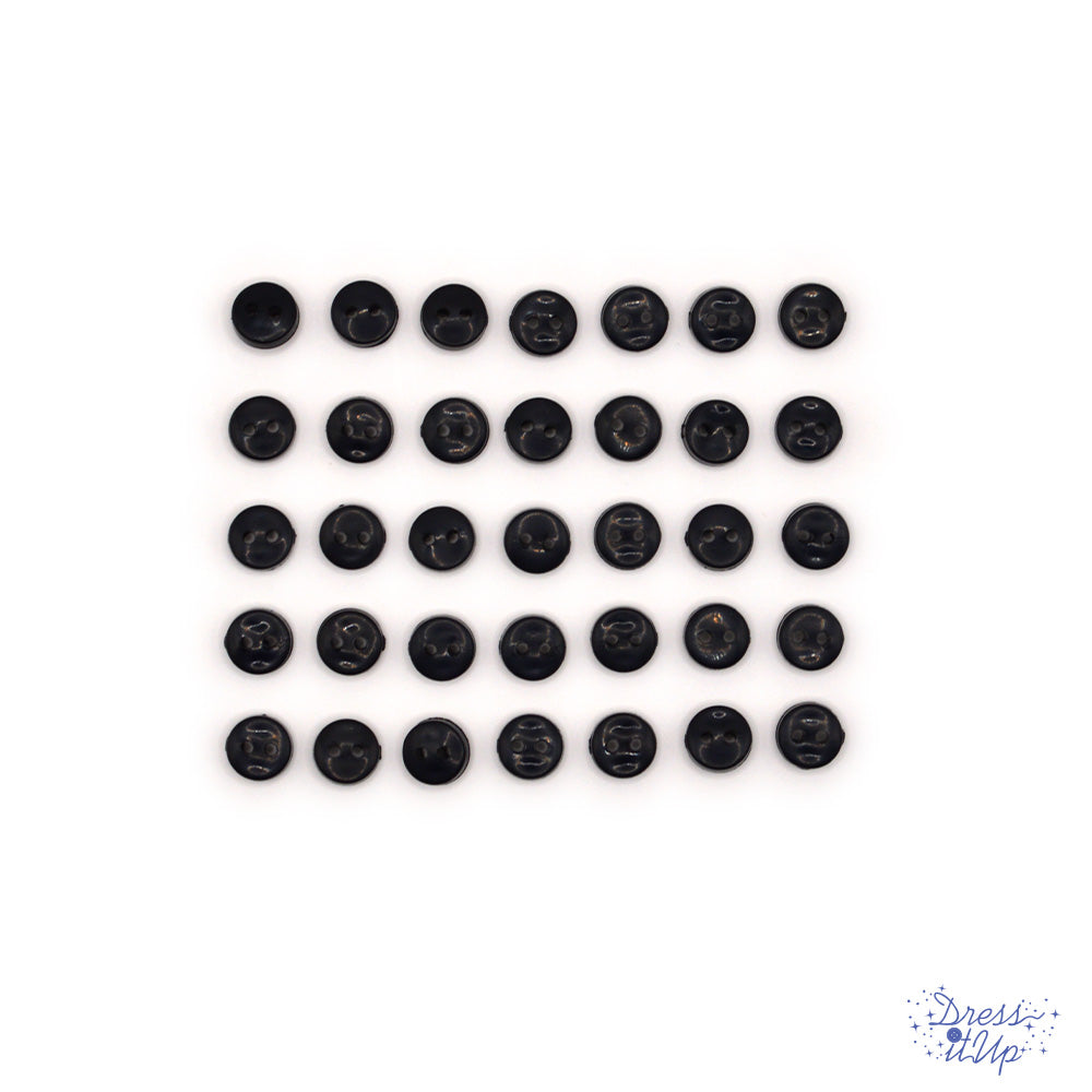 6mm round black buttons on a white background. Buttons made for sewing projects. 